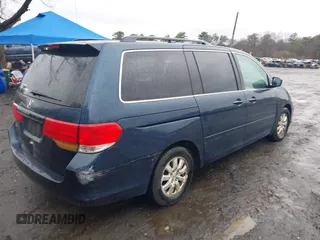 2010 Honda Odyssey EX with VIN 5FNRL3H41AB061674, listed as a IAAI auction lot 41954700 with 115,722 mi miles. Bid and sale history available at carsss.com. Image 4.