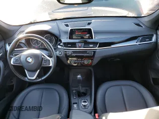 2018 BMW X1 xDrive28i with VIN WBXHT3C38J5K24660, listed as a Copart auction lot 44387043 with 59,786 mi miles. Bid and sale history available at carsss.com. Image 8.
