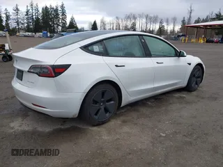 2021 Tesla Model 3 Long Range with VIN 5YJ3E1EB3MF856009, listed as a IAAI auction lot 41809767 with 42,072 mi miles. Bid and sale history available at carsss.com. Image 4.