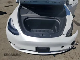 2024 Tesla Model Y Long Range с VIN 7SAYGDEE6RF157415, выставлен на аукционе Copart как лот 54950915 с пробегом 20 567 миль миль и Списание • Salvage title. История ставок и продаж доступна на DreamBid. Изображение 11.