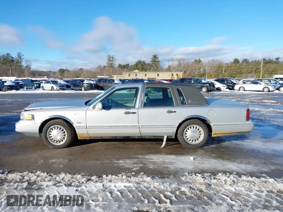 1997 Lincoln Town Car Cartier with VIN 1LNLM83W9VY661126, listed as a IAAI auction lot 41456847 with 160,710 mi miles and . Bid and sale history available at DreamBid. Image 14.