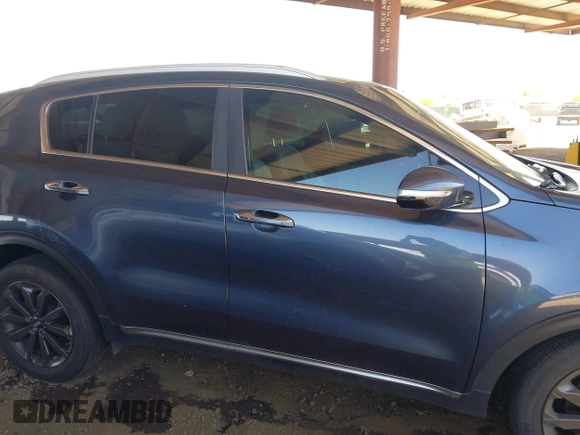 2019 Kia Sportage EX z VIN KNDPN3AC5K7539461, wystawiony jako IAAI lot #42180598 z przebiegiem 69 072 mil mil oraz . Historia ofert i sprzedaży dostępna na DreamBid. Obrazek 14.