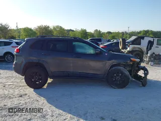 2018 Jeep Cherokee Trailhawk with VIN 1C4PJMBX7JD517299, listed as a IAAI auction lot 42022770 with 62,865 mi miles. Bid and sale history available at carsss.com. Image 14.