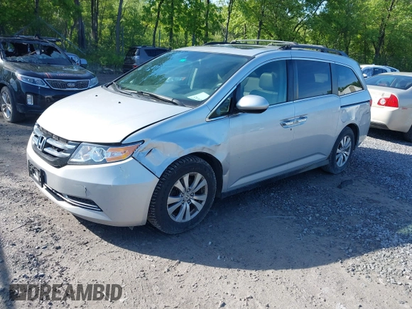2014 Honda Odyssey EX-L with VIN 5FNRL5H61EB128311, listed as a IAAI auction lot 42334932 with 270,135 mi miles and . Bid and sale history available at DreamBid. Image 16.