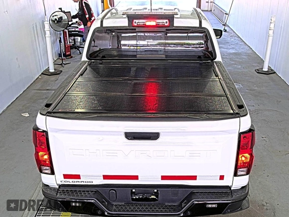 2023 Chevrolet Colorado 4WD Work Truck with VIN 1GCGTBEC6P1200177, listed as a IAAI auction lot 42667374 with 8,222 mi miles and . Bid and sale history available at DreamBid. Image 5.
