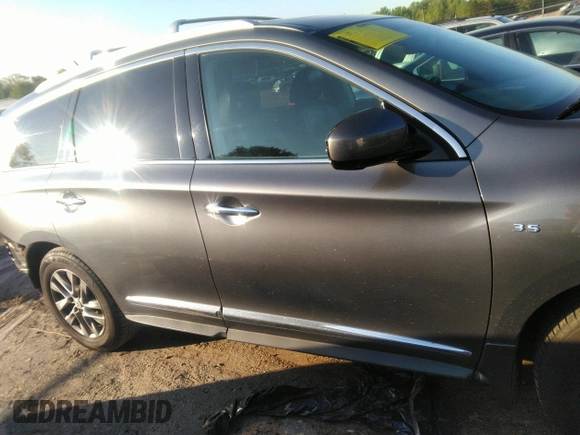 2015 Infiniti QX60 with VIN 5N1AL0MN4FC542609, listed as a IAAI auction lot 41977496 with 113,079 mi miles and . Bid and sale history available at DreamBid. Image 13.