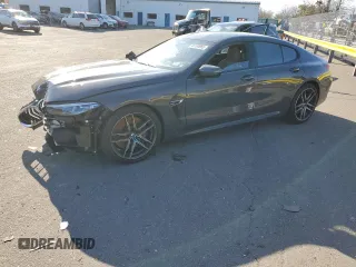 2020 BMW M8 with VIN WBSGV0C02LCE26394, listed as a Copart auction lot 46100865 with 52,713 mi miles and Salvage Title. Bid and sale history available at carsss.com. Image 1.