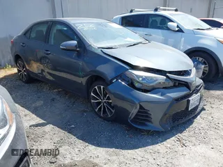 2018 Toyota Corolla L with VIN 5YFBURHE8JP821159, listed as a IAAI auction lot 42397478 with 105,755 mi miles and . Bid and sale history available at DreamBid. Image 1.