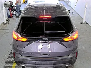 2021 Ford Edge Titanium z VIN 2FMPK3K92MBA53689, wystawiony jako IAAI lot #42501151 z przebiegiem 93 941 mil mil oraz . Historia ofert i sprzedaży dostępna na DreamBid. Obrazek 12.