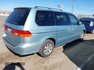 2004 Honda Odyssey EX-L with VIN 5FNRL18944B043710, listed as a IAAI auction lot 41862417 with 380,589 mi miles and . Bid and sale history available at DreamBid. Image 4.
