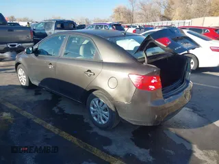 2011 Kia Forte EX with VIN KNAFU4A25B5358977, listed as a IAAI auction lot 40992404 with 137,478 mi miles. Bid and sale history available at carsss.com. Image 3.