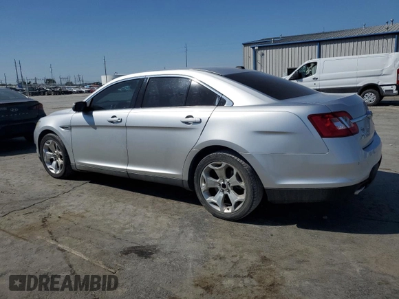 2011 Ford Taurus SEL with VIN 1FAHP2EWXBG175623, listed as a Copart auction lot 68707944 with 185,826 mi miles and Salvage Title. Bid and sale history available at DreamBid. Image 2.