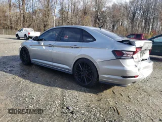 2019 Volkswagen Jetta GLI S z VIN 3VW5T7BU3KM207016, wystawiony jako Copart lot #67631372 z przebiegiem 53 762 mil mil oraz . Historia ofert i sprzedaży dostępna na DreamBid. Obrazek 2.