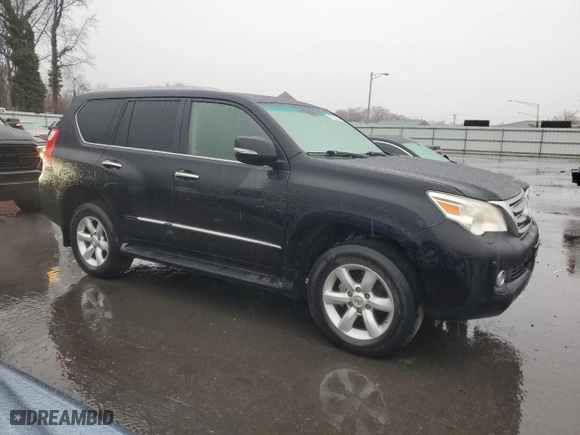 2010 Lexus GX 460 Premium with VIN JTJJM7FX2A5012934, listed as a Copart auction lot 43144395 with 180,183 mi miles and Salvage Title. Bid and sale history available at carsss.com. Image 4.
