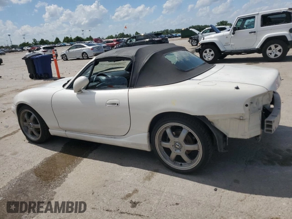 2000 Mazda MX-5 Miata with VIN JM1NB3531Y0152594, listed as a Copart auction lot 57460195 with 78,139 mi miles and Salvage title. Bid and sale history available at DreamBid. Image 2.