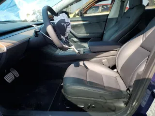 2023 Tesla Model 3 Performance z VIN 5YJ3E1EC5PF634178, wystawiony jako Copart lot #52530845 z przebiegiem 22 618 mil mil oraz Szkoda całkowita • Salvage title. Historia ofert i sprzedaży dostępna na DreamBid. Obrazek 7.