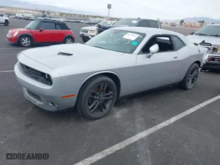 2019 Dodge Challenger SXT with VIN 2C3CDZGG3KH683582, listed as a IAAI auction lot 40073064 with 78,243 mi miles. Bid and sale history available at carsss.com. Image 2.