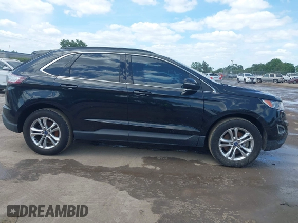 2015 Ford Edge SEL with VIN 2FMTK4J90FBB02669, listed as a IAAI auction lot 42176184 with 213,465 mi miles. Bid and sale history available at carsss.com. Image 13.
