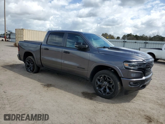 2023 Ram 1500 Limited with VIN 1C6SRFHT2PN598127, listed as a Copart auction lot 49065505 with 31,761 mi miles and Salvage title. Bid and sale history available at DreamBid. Image 4.