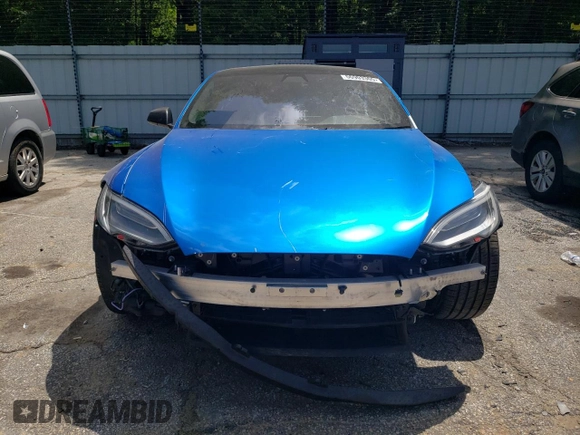 2021 Tesla Model S Plaid with VIN 5YJSA1E64MF438794, listed as a Copart auction lot 56903365 with 63,671 mi miles and Salvage title. Bid and sale history available at DreamBid. Image 5.