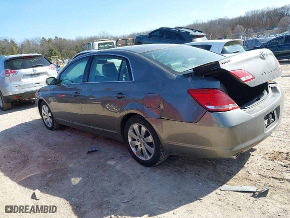 2005 Toyota Avalon XL with VIN 4T1BK36B65U027633, listed as a IAAI auction lot 41769335 with 89,904 mi miles. Bid and sale history available at carsss.com. Image 3.