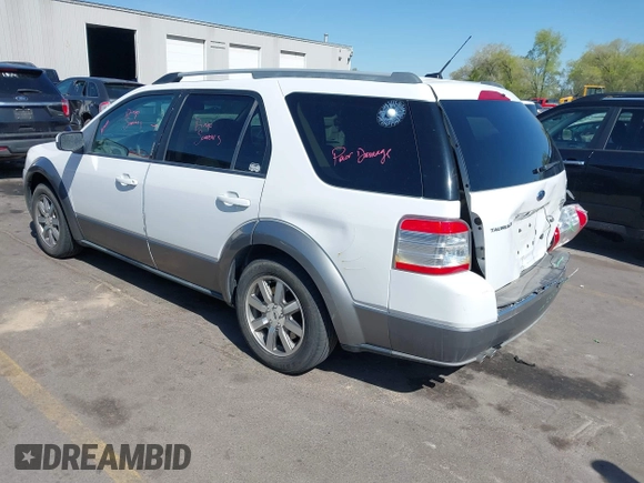 2008 Ford Taurus X SEL with VIN 1FMDK05W98GA41945, listed as a IAAI auction lot 42067959 with 157,896 mi miles and . Bid and sale history available at DreamBid. Image 3.