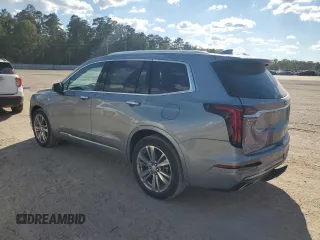 2023 Cadillac XT6 FWD Premium Luxury with VIN 1GYKPCRS0PZ231233, listed as a Copart auction lot 73210244 with 14,604 mi miles and Salvage Title. Bid and sale history available at carsss.com. Image 2.