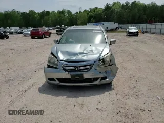 2007 Honda Odyssey EX-L with VIN 5FNRL38657B059033, listed as a Copart auction lot 54005495 with 212,674 mi miles and Salvage Title. Bid and sale history available at DreamBid. Image 14.