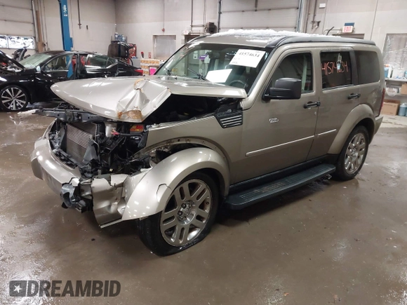 2007 Dodge Nitro SLT z VIN 1D8GU58K57W673543, wystawiony jako IAAI lot #41574634 z przebiegiem 64 286 mil mil oraz . Historia ofert i sprzedaży dostępna na DreamBid. Obrazek 2.