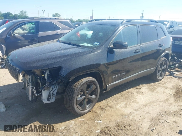 2021 Jeep Cherokee Altitude with VIN 1C4PJLLBXMD112667, listed as a IAAI auction lot 41959004 with 25,524 mi miles and . Bid and sale history available at DreamBid. Image 2.