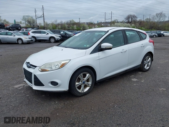 2013 Ford Focus SE with VIN 1FADP3K23DL216383, listed as a IAAI auction lot 41871603 with 87,715 mi miles. Bid and sale history available at carsss.com. Image 2.
