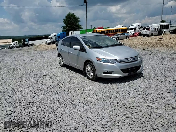 2010 Honda Insight EX with VIN JHMZE2H76AS021610, listed as a Copart auction lot 62992225 with 162,974 mi miles and Salvage title. Bid and sale history available at DreamBid. Image 14.