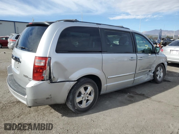 2009 Dodge Grand Caravan SXT z VIN 2D8HN54159R620187, wystawiony jako Copart lot #84703224 z przebiegiem 206 240 mil mil oraz Szkoda całkowita • Salvage title. Historia ofert i sprzedaży dostępna na DreamBid. Obrazek 3.