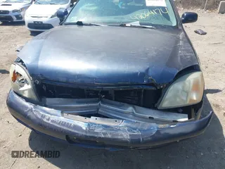 2002 Cadillac DeVille DTS with VIN 1G6KF57912U205527, listed as a IAAI auction lot 42064174 with 135,002 mi miles. Bid and sale history available at carsss.com. Image 6.