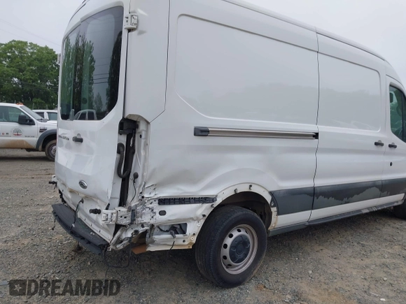2015 Ford Transit Cargo with VIN 1FTNR2CM4FKA26975, listed as a IAAI auction lot 39407096 with 150,786 mi miles and . Bid and sale history available at carsss.com. Image 6.