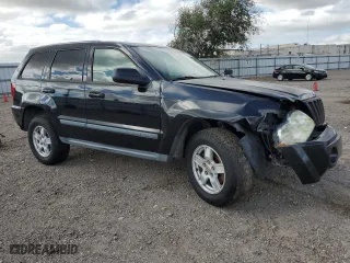 2007 Jeep Grand Cherokee Laredo with VIN 1J8HS48P37C594980, listed as a Copart auction lot 74819394 with 105,904 mi miles and Salvage Title. Bid and sale history available at carsss.com. Image 4.