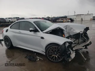 2020 BMW M2 Competition with VIN WBS2U7C01L7D66378, listed as a Copart auction lot 86432704 with 56,973 mi miles and Salvage Title. Bid and sale history available at carsss.com. Image 4.