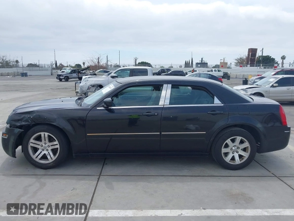 2006 Chrysler 300 Touring with VIN 2C3KA53G76H200278, listed as a IAAI auction lot 42044879 with 122,601 mi miles and . Bid and sale history available at DreamBid. Image 13.