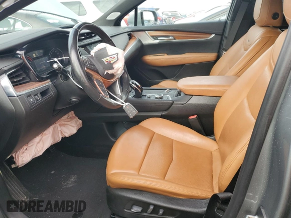 2023 Cadillac XT5 FWD Premium Luxury with VIN 1GYKNCRS6PZ100071, listed as a Copart auction lot 76248224 with 25,613 mi miles and Salvage Title. Bid and sale history available at carsss.com. Image 7.