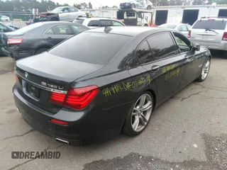 2013 BMW 7 Series 750Li xDrive with VIN WBAYF8C51DD140657, listed as a IAAI auction lot 32751348 with 128,816 mi miles. Bid and sale history available at carsss.com. Image 4.