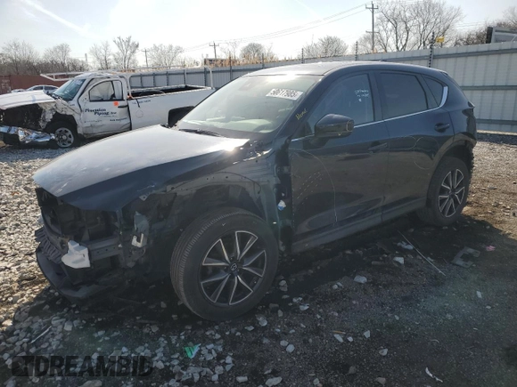 2017 Mazda CX-5 Grand Touring with VIN JM3KFBDL7H0202019, listed as a Copart auction lot 50617985 with 63,089 mi miles and Salvage Title. Bid and sale history available at carsss.com. Image 1.