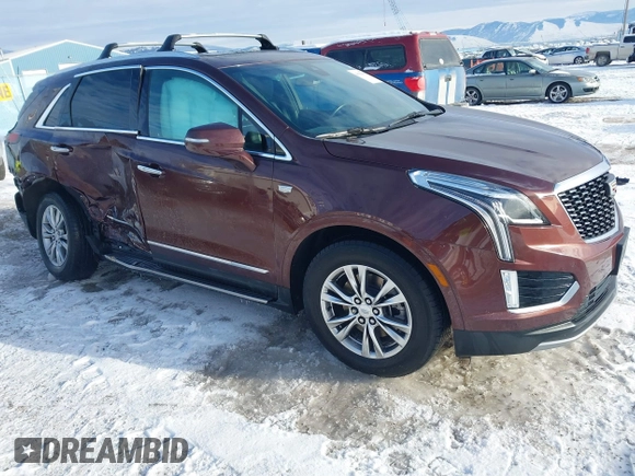 2022 Cadillac XT5 AWD Premium Luxury with VIN 1GYKNDRS9NZ128658, listed as a IAAI auction lot 41330193 with 34,361 mi miles and . Bid and sale history available at DreamBid. Image 1.