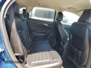 2020 Ford Edge SEL z VIN 2FMPK3J9XLBA59093, wystawiony jako Copart lot #52542645 z przebiegiem 128 059 mil mil oraz Czysty tytuł • Clean title. Historia ofert i sprzedaży dostępna na DreamBid. Obrazek 11.