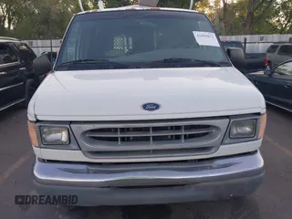 2001 Ford Econoline Cargo z VIN 1FTNE24L51HB29068, wystawiony jako IAAI lot #42495072 z przebiegiem 186 061 mil mil oraz . Historia ofert i sprzedaży dostępna na DreamBid. Obrazek 6.