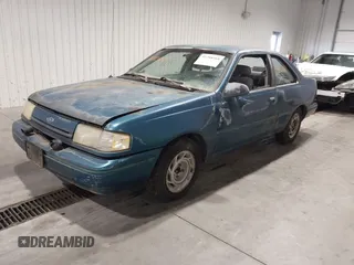1993 Ford Tempo z VIN 1FAPP31X5PK229656, wystawiony jako IAAI lot #41788568 z przebiegiem 64 620 mil mil oraz . Historia ofert i sprzedaży dostępna na DreamBid. Obrazek 2.