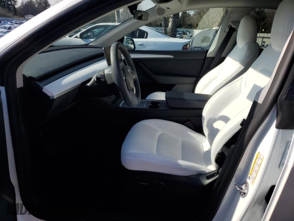 2023 Tesla Model Y Long Range with VIN 7SAYGDEE5PF831826, listed as a Copart auction lot 43752525 with 22,337 mi miles and Salvage Title. Bid and sale history available at DreamBid. Image 7.