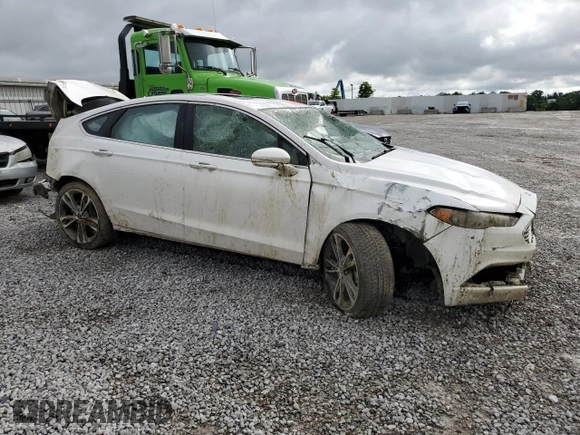 2017 Ford Fusion Titanium z VIN 3FA6P0K93HR227511, wystawiony jako Copart lot #60719505 z przebiegiem Nie podano mil oraz Szkoda całkowita • Salvage title. Historia ofert i sprzedaży dostępna na DreamBid. Obrazek 4.