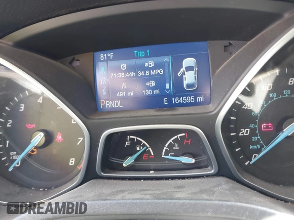 2014 Ford Focus SE with VIN 1FADP3F26EL270868, listed as a IAAI auction lot 41826493 with 164,595 mi miles. Bid and sale history available at carsss.com. Image 7.