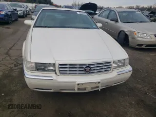 1999 Cadillac Eldorado z VIN 1G6EL12Y5XU600699, wystawiony jako Copart lot #88164505 z przebiegiem 140 075 mil mil oraz Szkoda całkowita • Salvage title. Historia ofert i sprzedaży dostępna na DreamBid. Obrazek 5.