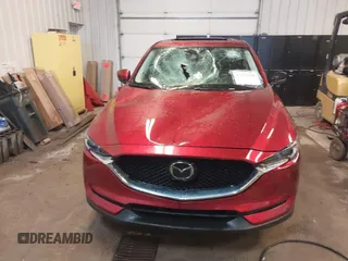 2020 Mazda CX-5 Grand Touring with VIN JM3KFBDMXL0840847, listed as a IAAI auction lot 41732185 with 36,248 mi miles. Bid and sale history available at carsss.com. Image 12.